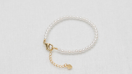 Handmade Hmong or Miao silver jewelry display on white background