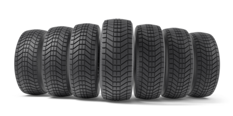 A row of six automobile tires isolated on white background