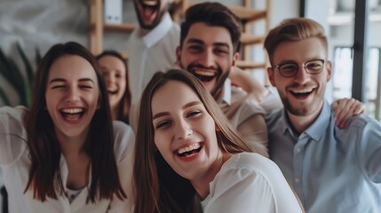 Obraz premium Portrait of a group of joyful happy business people men and women having fun and looking cheerful at camera standing in office Company employees team or a group of staff happy to make : Generative AI