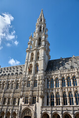 Fototapeta premium Spire of the gothic townhouse of Brussels on a sunny day with clear blue sky