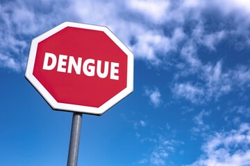 Stop traffic sign with text DENGUE to prevent this fever in Europe