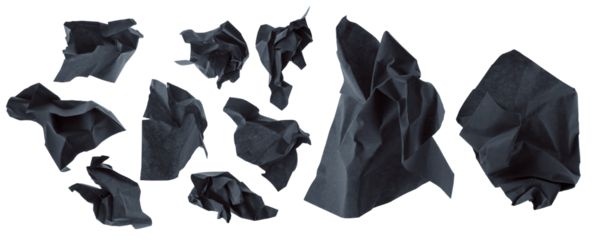 Piece of Crumpled Black Paper, Backlit From Below. Visible Creases and Unevenness on Pieces of Cardboard. No Background. Grunge Demaged Paper Balls. Paper Trash. Wastepaper.	
