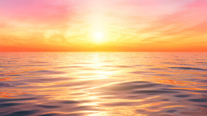 Fototapeta premium A breathtaking sunrise over placid ocean waters, with the sky glowing in warm colors of yellow, orange, and pink, reflecting beautifully on the calm, rippling surface of the sea.