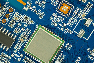 Microchip on Blue Circuit Board