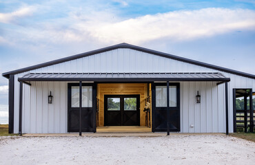 white Metal Horse barn