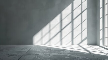 Obraz premium Abstract geometric shapes formed by sunlight through a window, shadows creating a minimalist pattern on a white wall, crisp and clean aesthetic