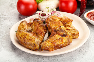 Grilled chicken wings with sauce