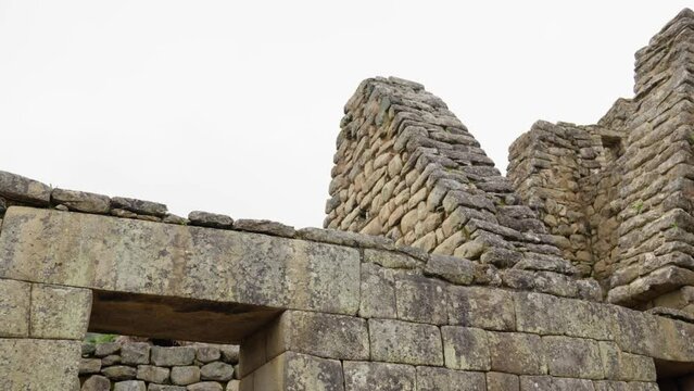 Triangular Roofs and Stone Constructions in Machu Picchu. Unfinished Inca Structures