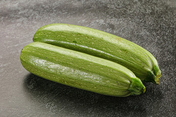 Raw green ripe zucchini vegetable
