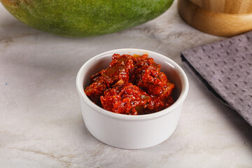 Spicy pickled raw green mango