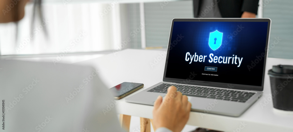 Poster cyber security system on computer screen protect private information snugly from hacker and cyber at