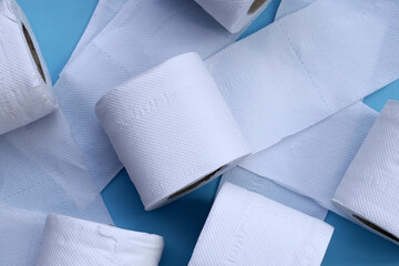 Toilet paper on blue background.