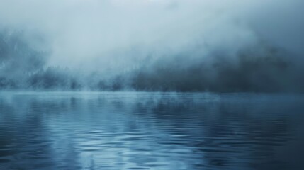 Dense fog over serene lake blue-gray ethereal ambiance