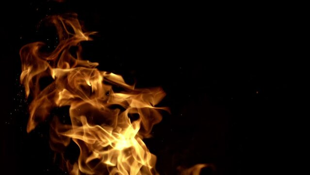 Fire in fireplace. Burning fire. Blaze fire flame on black, overlay design. Burning concept. Blaze flames overlay background. Burning fire. Stove firebox. Heat coal wood for fireplace. Fires sparks.