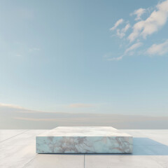 There is an empty square marble table in the centre of the picture with a simple, clean background and a light blue sky in the background 