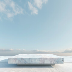 There is an empty square marble table in the centre of the picture with a simple, clean background and a light blue sky in the background 