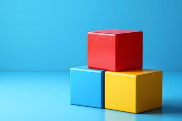 Three Colorful Blocks on Blue Background