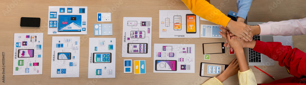 Poster top view banner of startup company ui or ux developer joining hand over user interface prototype for