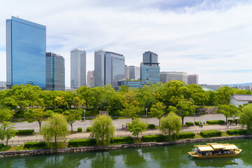 Urban Oasis River and Osaka Cityscape