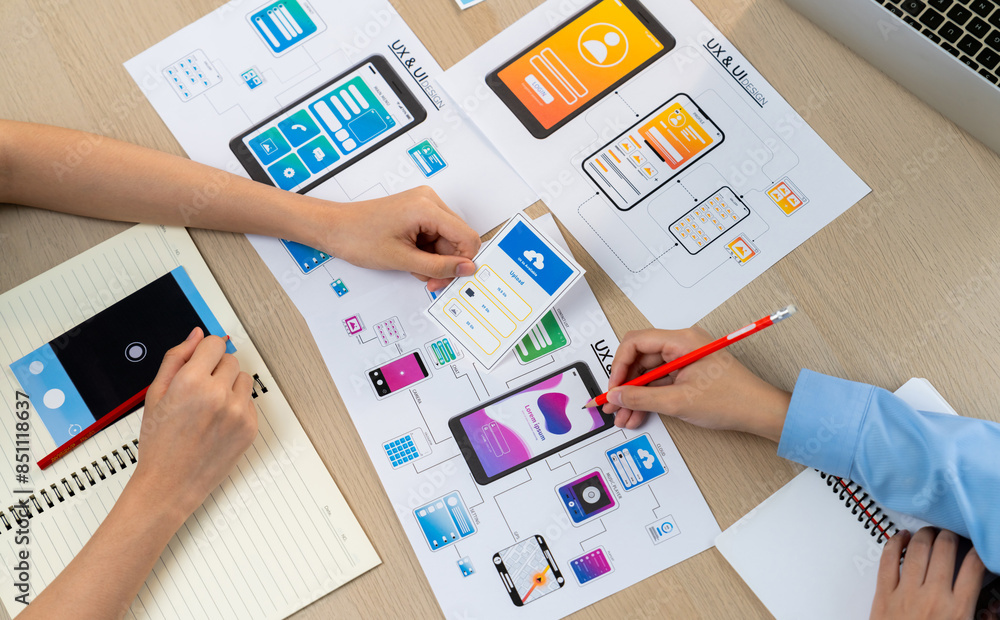 Poster panorama banner of startup company employee planning on user interface prototype for mobile applicat