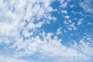 gentle clouds in the blue sky