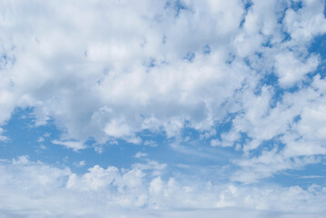gentle clouds in the blue sky