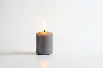 Single Burning Gray Candle on White Background
