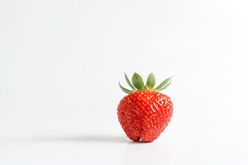 Single Strawberry on White Background