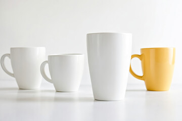 Obraz premium White and Yellow Mugs on White Background