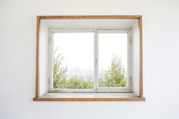 Fototapeta premium Window with a view of a city
