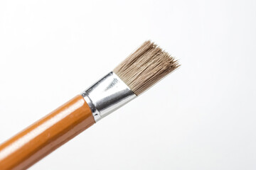 Fototapeta premium Close up of a paintbrush on a white background