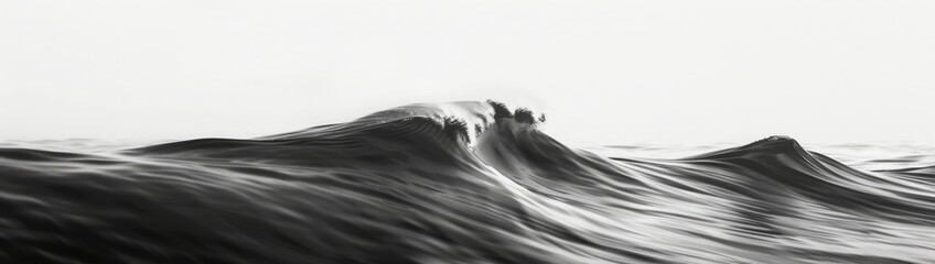 Black and white slow shutter of wave rising on oceans surface