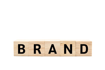 Wooden cube blocks with BRAND text isolated on white background. Build your Brand. Brand building, success, business. Copy space and Clipping path.