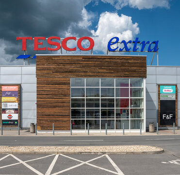 Zvolen, Slovakia - May, 25, 2024 : Tesco Extra supermarket signage. Tesco extra entrance.