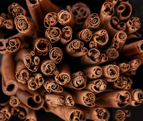 Cinnamon pods close-up together.