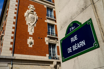 Fototapeta premium Typical vintage parisian street sign , Rue de Béarn