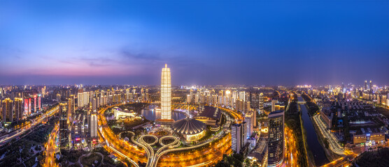 Illuminated Modern Cityscape at Dusk