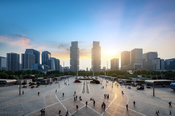 Sunset Over Modern Urban Plaza