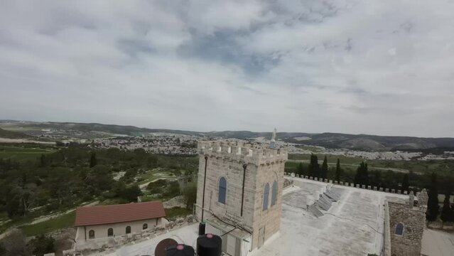 Aerial FPV video over Beit Jamal Catholic Monastery, Israel The landmark is located near Beit Shemes