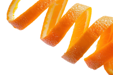 Close-up of orange peel swirling down Revealing the juicy parts inside Isolated on a white background
