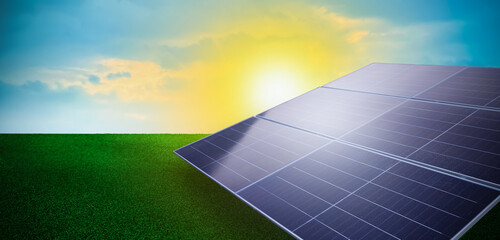 solar panels power plant on a green field with sunlight