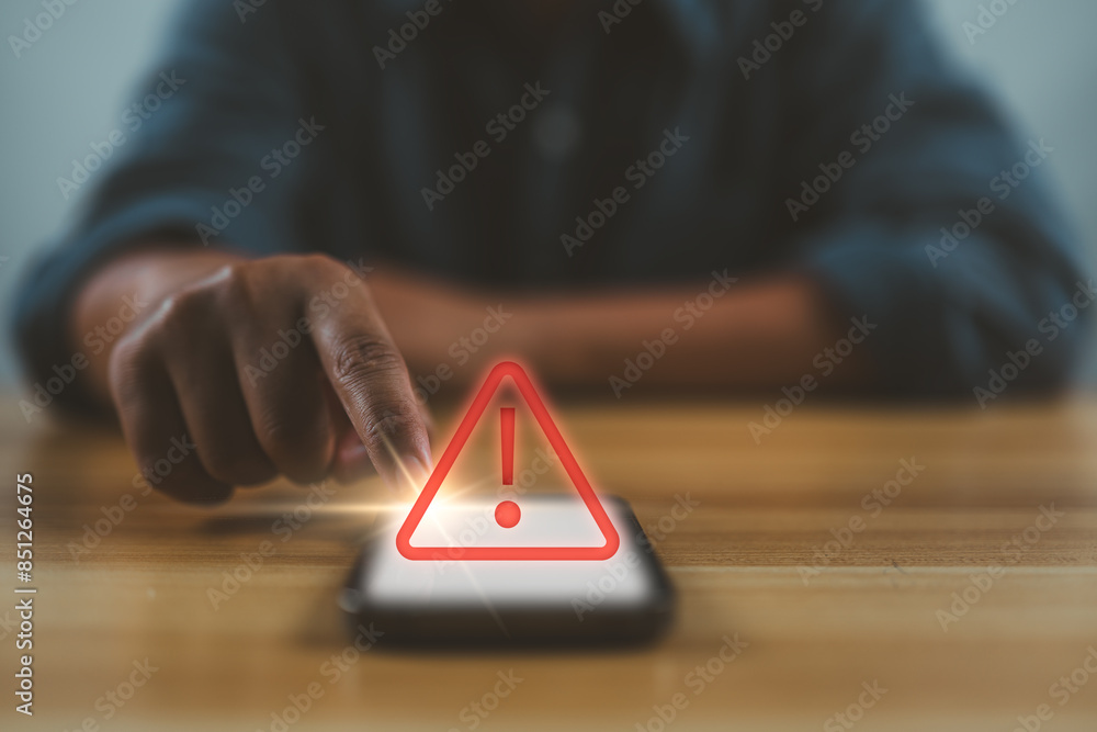 Poster Hand touching to smartphone with caution warning sign for notification error and maintenance concept.