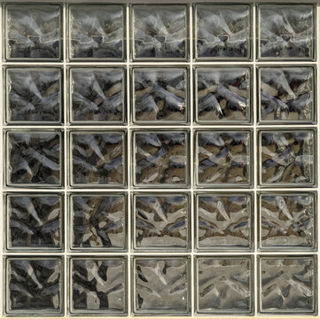 Transparent and wavy glass blocks texture or background. Translucent cubes for walls or windows. Square glass tiles for interior and exterior.