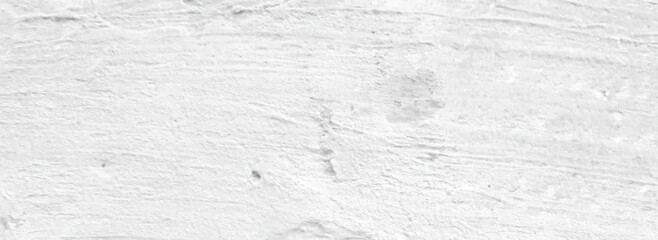 White old concrete wall grunge texture - wide banner format background with copy space for text. Grunge gray texture of chips, cracks, scratches, Soft white grunge.