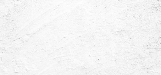 White old concrete wall grunge texture - wide banner format background with copy space for text. Grunge gray texture of chips, cracks, scratches, Soft white grunge.