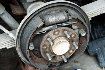 A wheel with a worn out brake pad