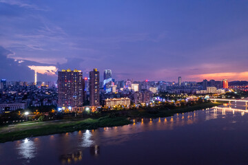 Obraz premium Aerial photography of the night scene of Hexi River Bank in Zhuzhou, China