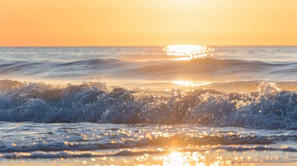 Captivating ocean sunrise with calm waters reflecting the soft pink and orange hues of the rising sun. Peaceful and tranquil scene.