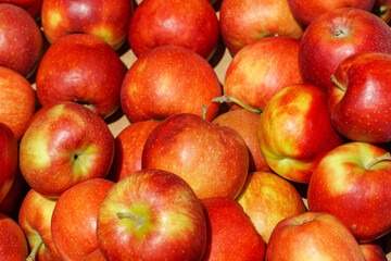 Apples in the fruit store. Fresh juicy fruits. Apple background.