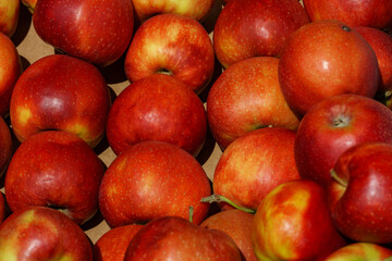 Apples in the fruit store. Fresh juicy fruits. Apple background.